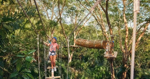 Kids on a hanging obstacle course at the KidsOnly Club at the One&Only Mandarina in Mexico