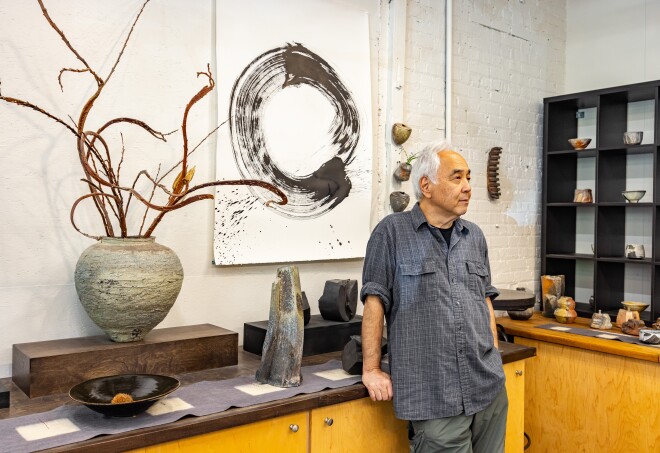 Akira Satake inside his ceramics gallery, Gallery Mugen in Asheville, North Carolina