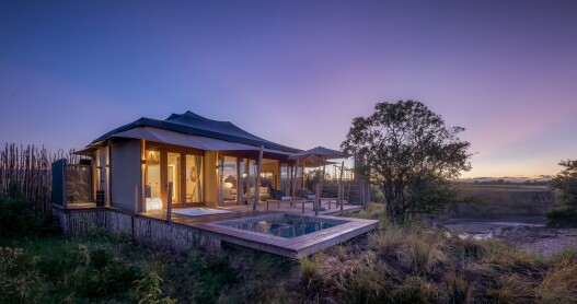 This tent at the JW Marriott Masai Mara Lodge in Kenya features a plunge pool that faces the Masai Mara landscape.