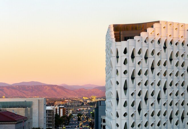 The Populus in Denver has a white exterior with eye-shaped windows.